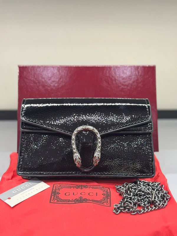 Guvcci mini dionysus cross body bag